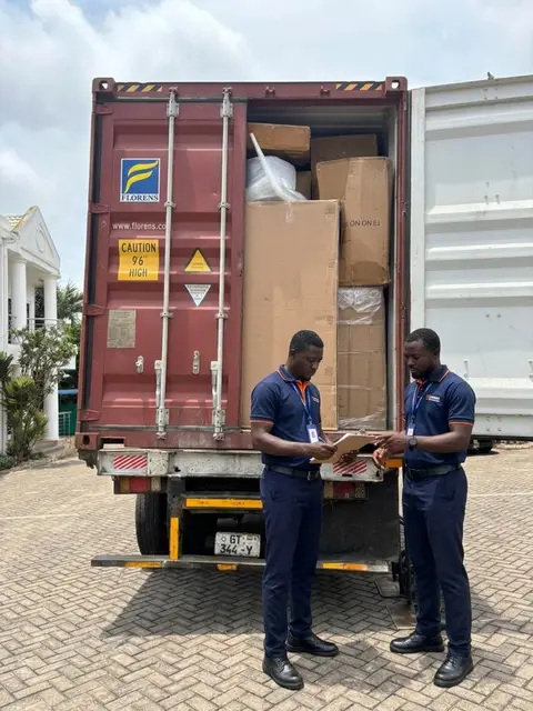 Our team inspecting a container delivery at the destination