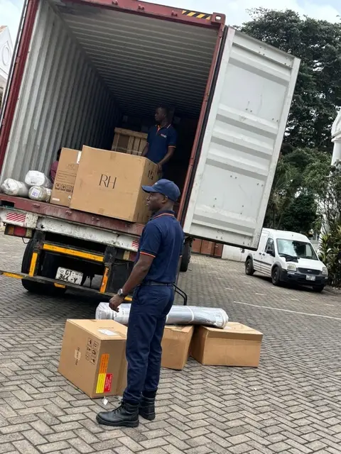 Cartons unloaded from a container truck